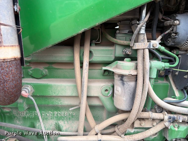 image for item EX2492 2003 John Deere 6615 MFWD tractor