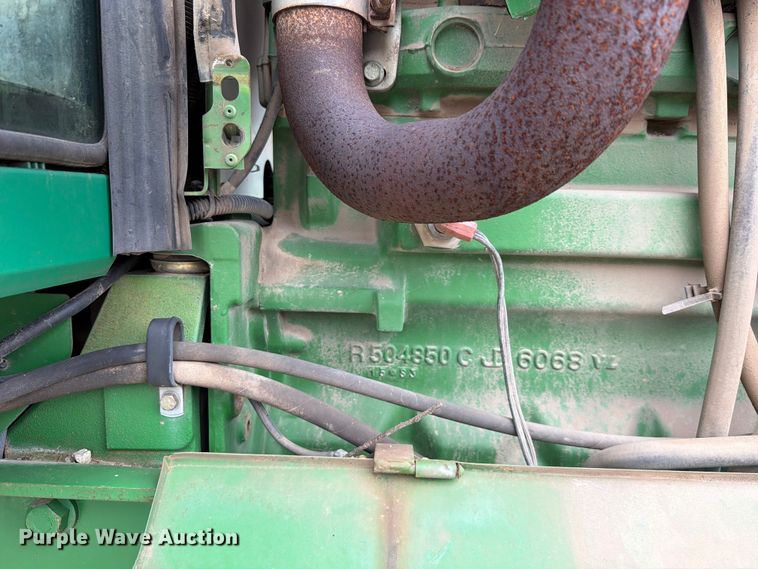 image for item EX2492 2003 John Deere 6615 MFWD tractor