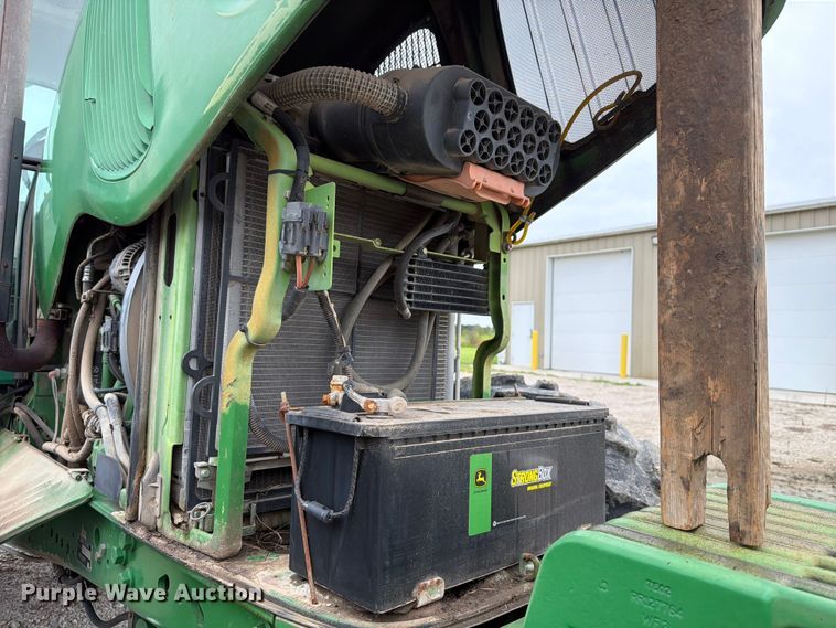image for item EX2492 2003 John Deere 6615 MFWD tractor