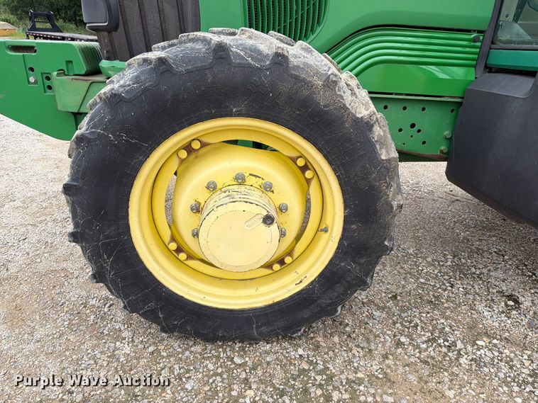 image for item EX2492 2003 John Deere 6615 MFWD tractor