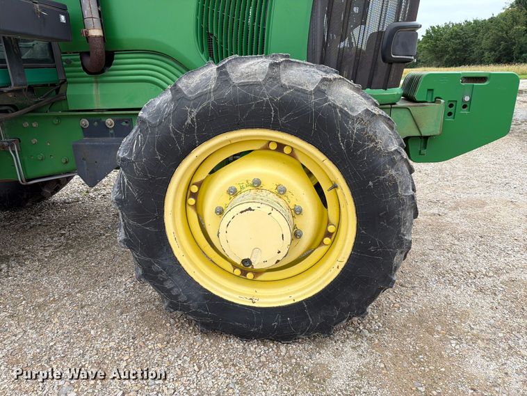 image for item EX2492 2003 John Deere 6615 MFWD tractor