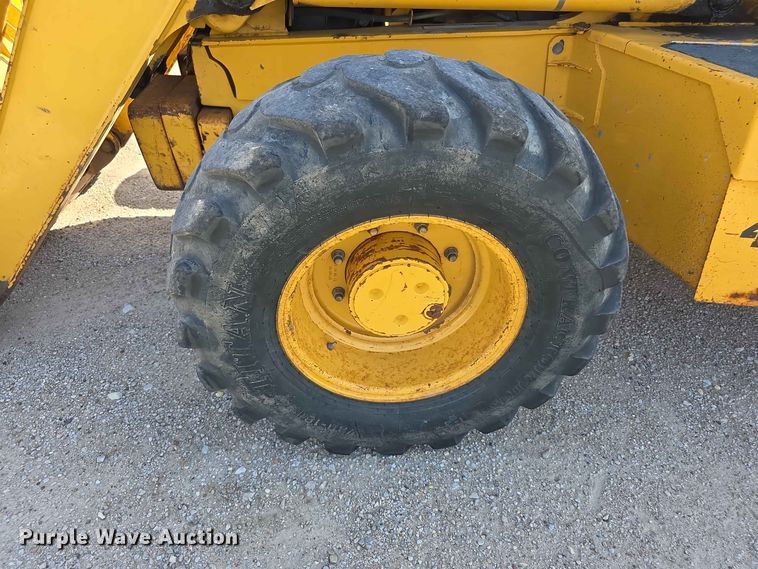 image for item FH6235 2002 John Deere 310SG backhoe