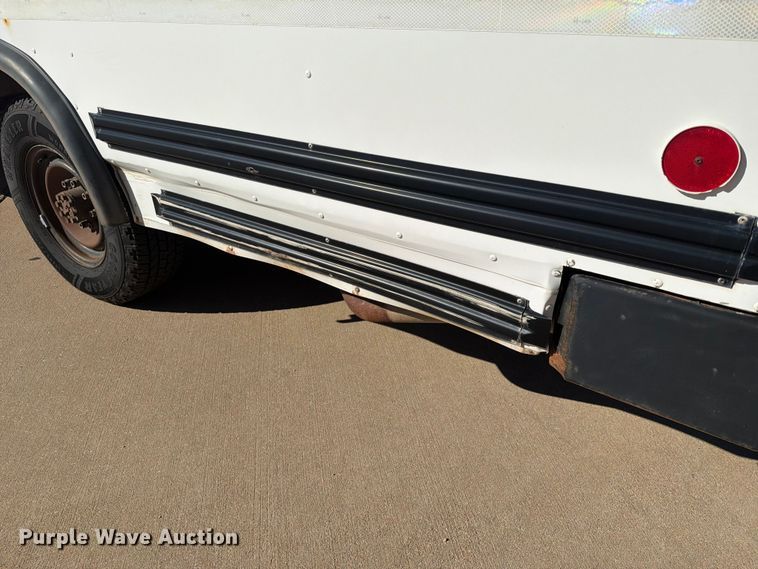 image for item NA9542 2001 Chevrolet Express 3500 shuttle bus