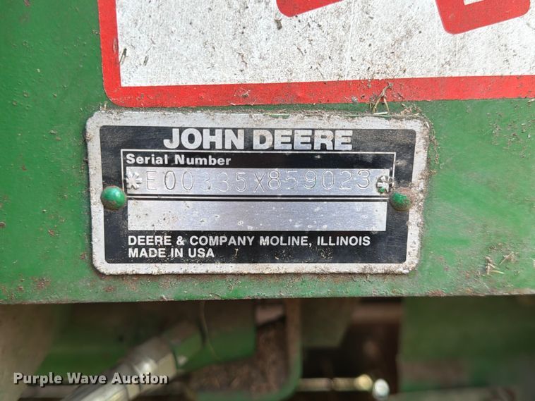 image for item DQ7904 John Deere 335 round baler