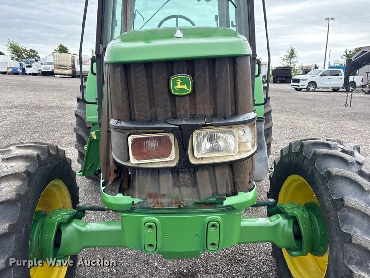 image for item EG9216 2005 John Deere 6415 MFWD tractor