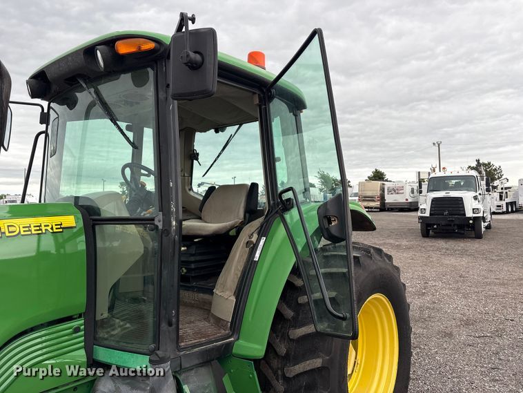 image for item EG9216 2005 John Deere 6415 MFWD tractor