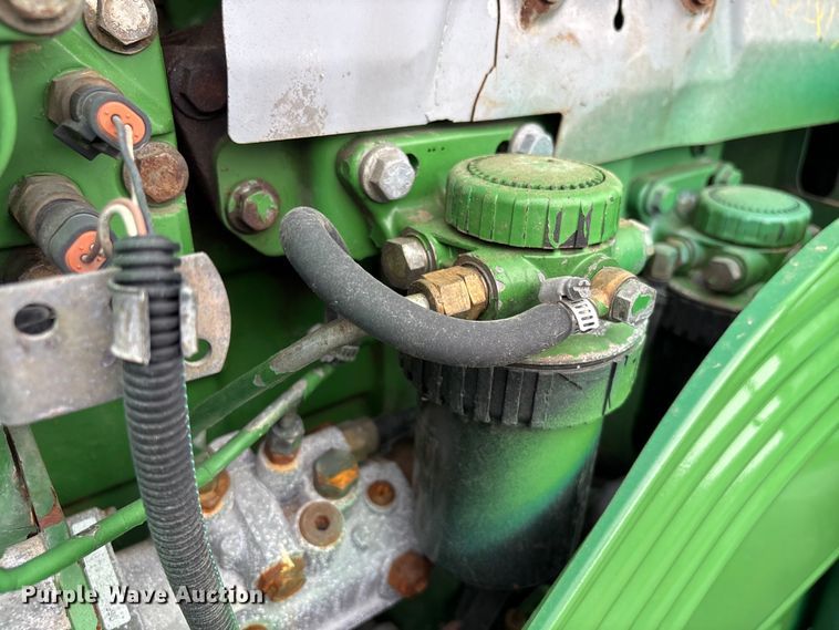 image for item EG9216 2005 John Deere 6415 MFWD tractor