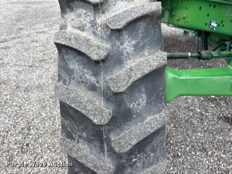 image for item EG9216 2005 John Deere 6415 MFWD tractor