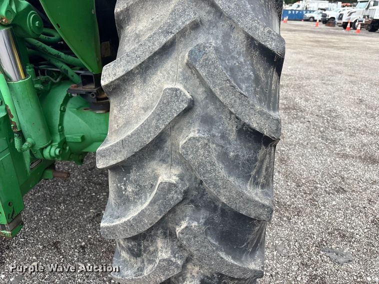 image for item EG9216 2005 John Deere 6415 MFWD tractor