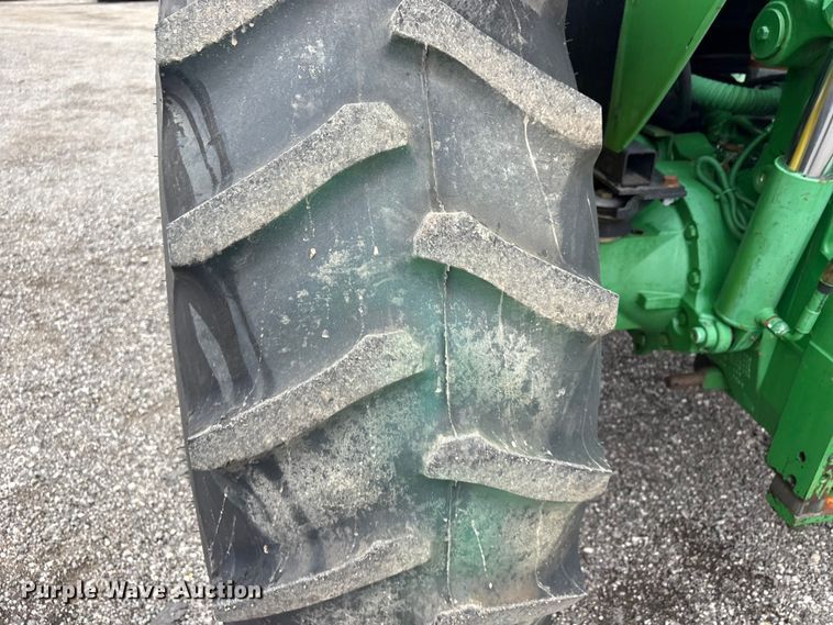 image for item EG9216 2005 John Deere 6415 MFWD tractor