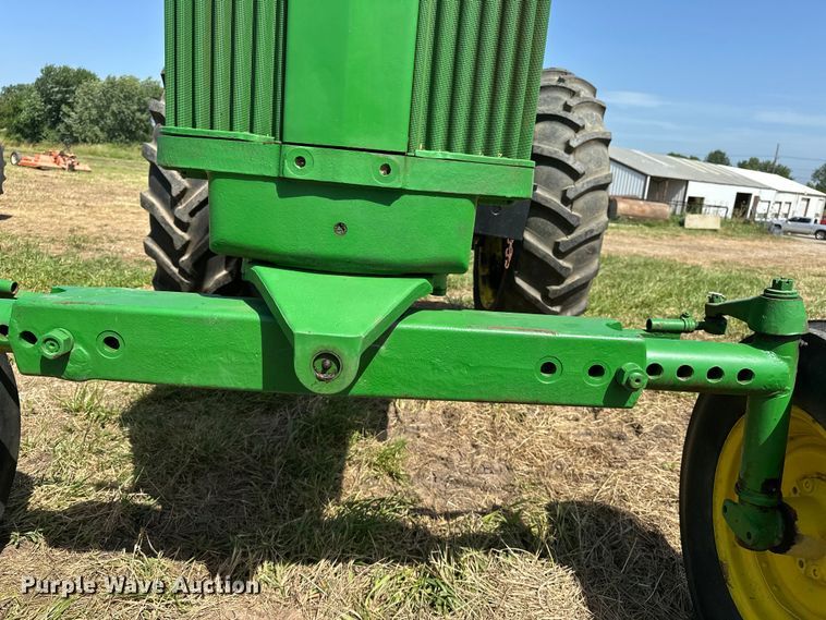 image for item ES6513 1957 John Deere 720 LP tractor