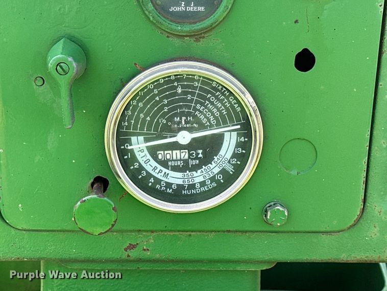 image for item ES6513 1957 John Deere 720 LP tractor