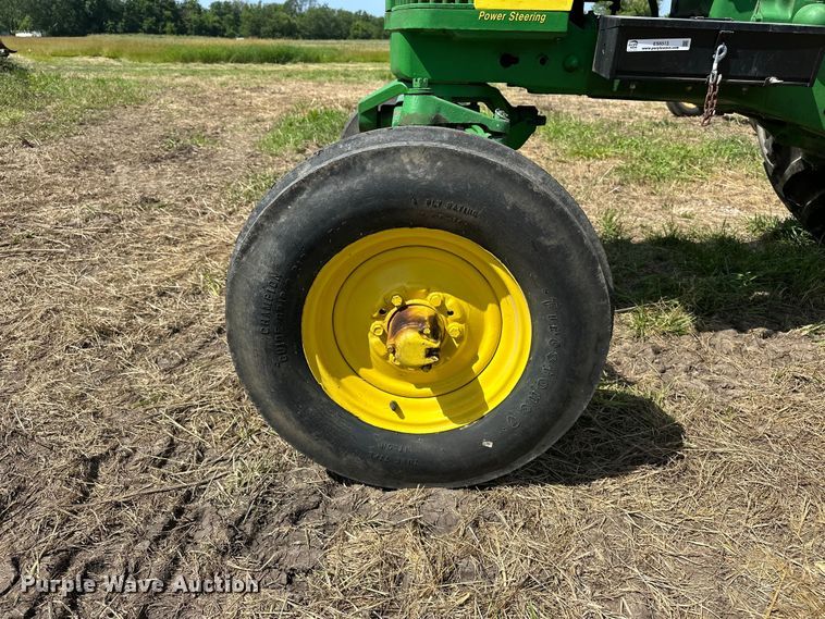 image for item ES6513 1957 John Deere 720 LP tractor