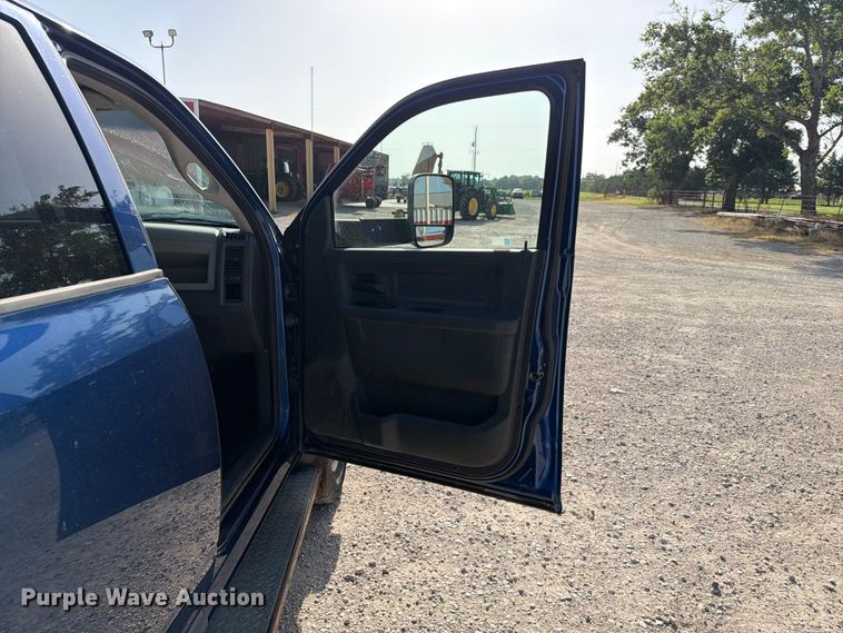 image for item EX4011 2011 Dodge Ram 3500 Heavy Duty Crew Cab flatbed pickup truck