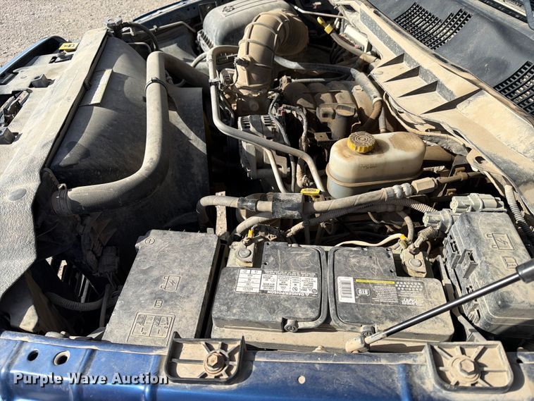 image for item EX4011 2011 Dodge Ram 3500 Heavy Duty Crew Cab flatbed pickup truck