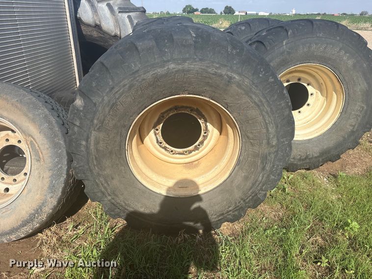 image for item FC2452 (4) 650/55R26.5 tires and wheels