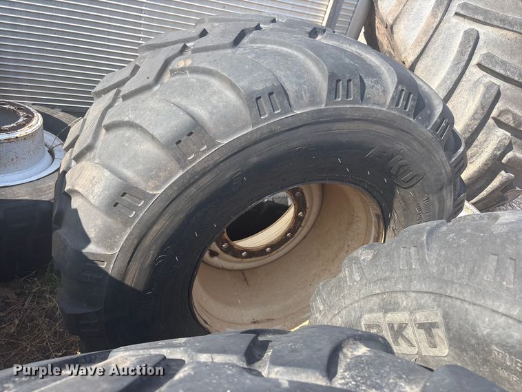 image for item FC2452 (4) 650/55R26.5 tires and wheels