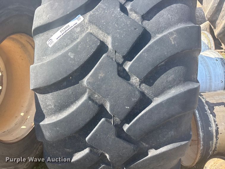 image for item FC2452 (4) 650/55R26.5 tires and wheels