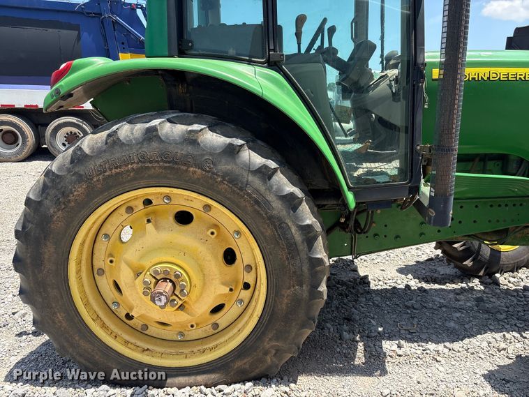 image for item YA3873 2004 John Deere 7320 MFWD tractor