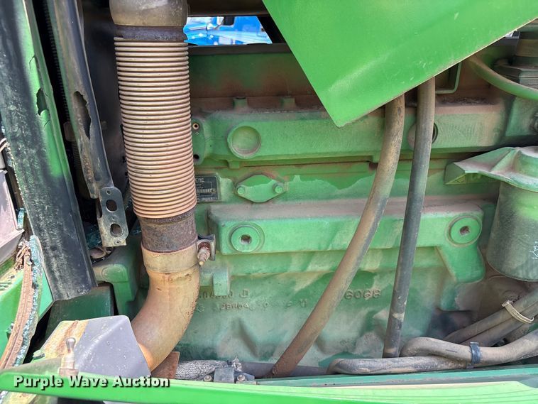 image for item YA3873 2004 John Deere 7320 MFWD tractor