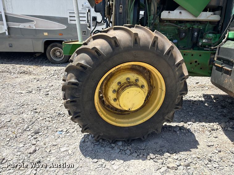 image for item YA3873 2004 John Deere 7320 MFWD tractor