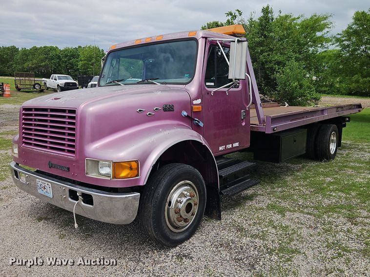 image for item EO7284 1998 International 4700 rollback truck