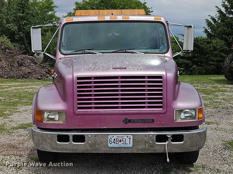 image for item EO7284 1998 International 4700 rollback truck