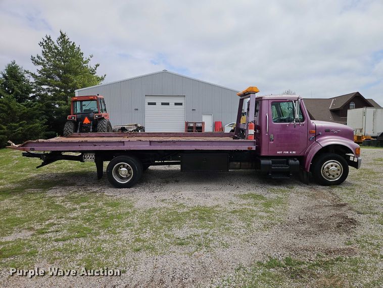 image for item EO7284 1998 International 4700 rollback truck