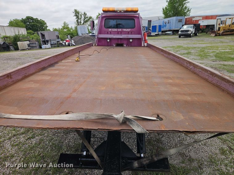 image for item EO7284 1998 International 4700 rollback truck
