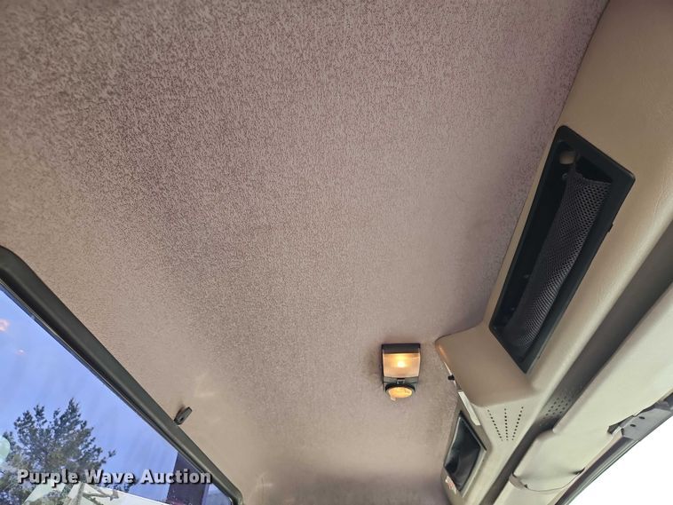 image for item EO7284 1998 International 4700 rollback truck