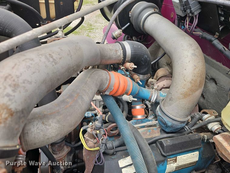 image for item EO7284 1998 International 4700 rollback truck