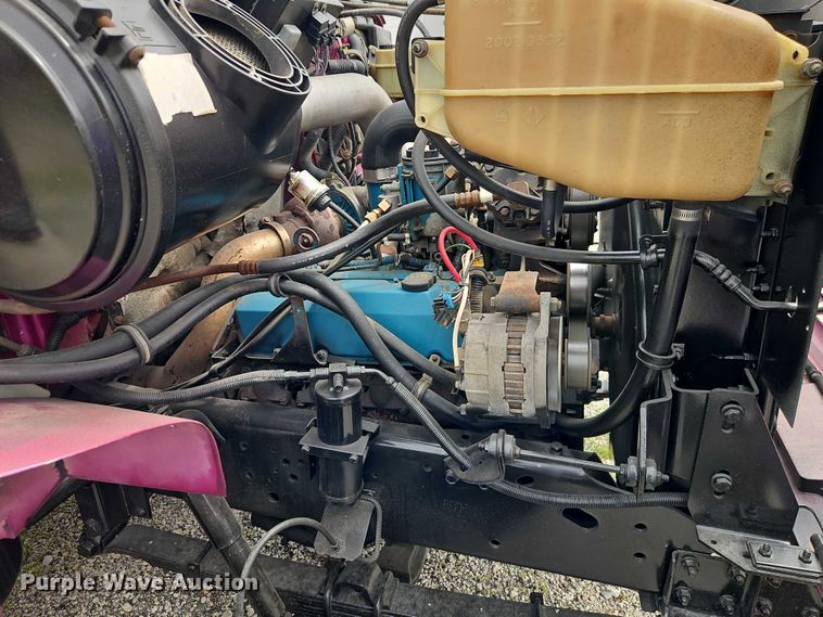 image for item EO7284 1998 International 4700 rollback truck