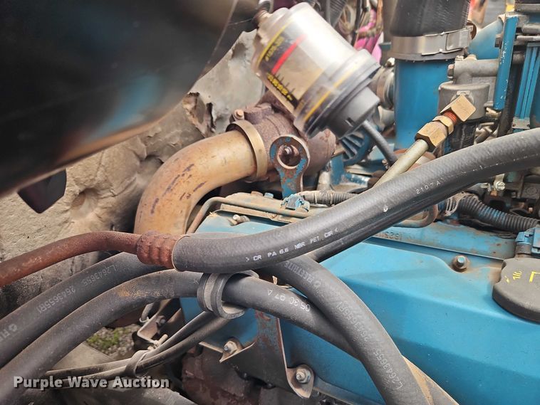 image for item EO7284 1998 International 4700 rollback truck
