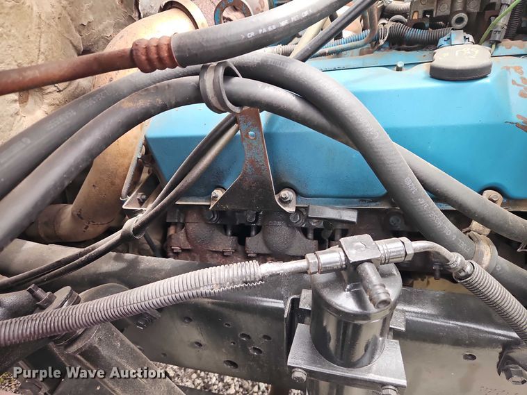 image for item EO7284 1998 International 4700 rollback truck