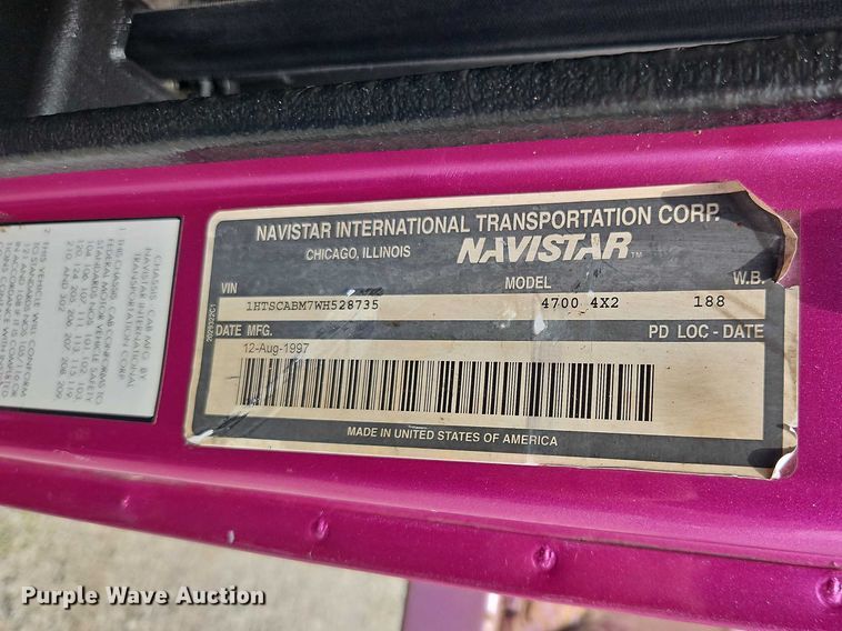 image for item EO7284 1998 International 4700 rollback truck