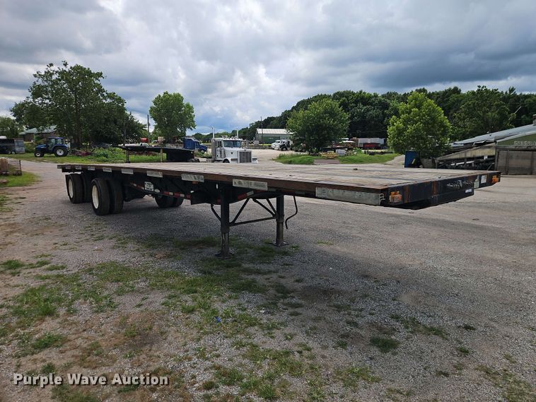 image for item EO8542 1999 Transcraft TL-2000 flatbed trailer