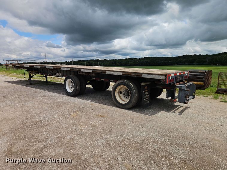 image for item EO8542 1999 Transcraft TL-2000 flatbed trailer
