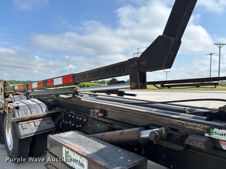 image for item FC1737 2013 Freightliner Business Class M2 roll-off container truck