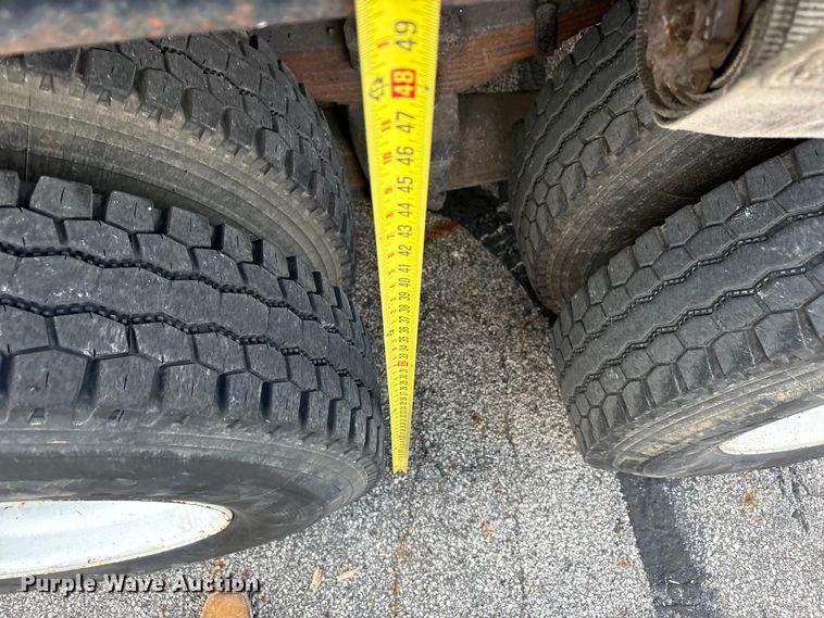 image for item FC2405 2001 GMC C7500 flatbed truck