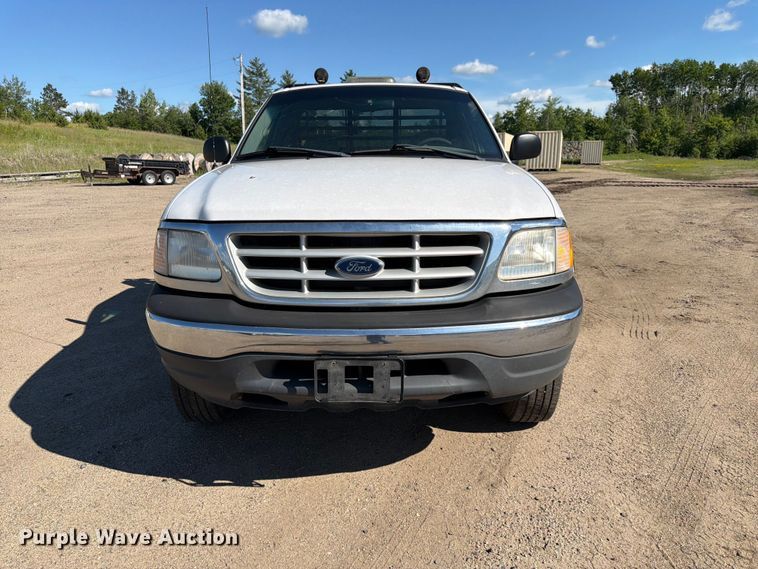 image for item DQ7920 1999 Ford F150 flatbed pickup truck
