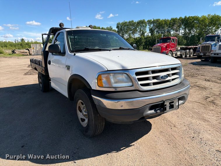 image for item DQ7920 1999 Ford F150 flatbed pickup truck