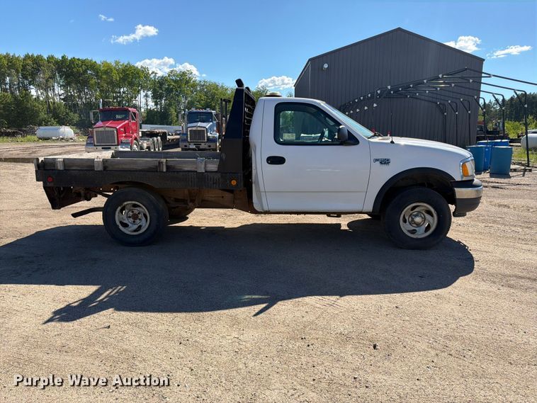 image for item DQ7920 1999 Ford F150 flatbed pickup truck