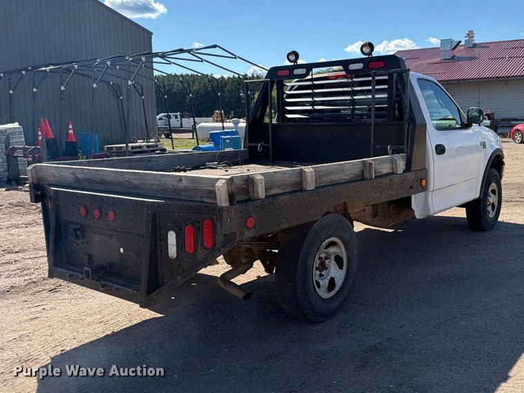 image for item DQ7920 1999 Ford F150 flatbed pickup truck