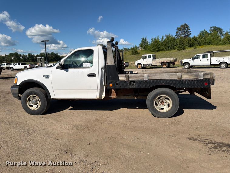 image for item DQ7920 1999 Ford F150 flatbed pickup truck