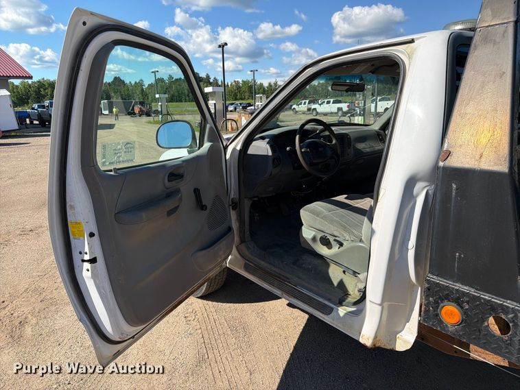 image for item DQ7920 1999 Ford F150 flatbed pickup truck