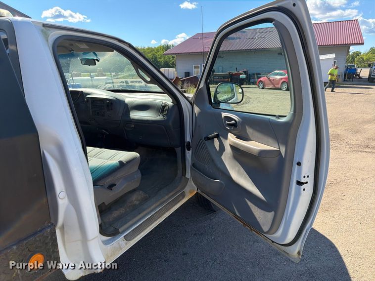 image for item DQ7920 1999 Ford F150 flatbed pickup truck