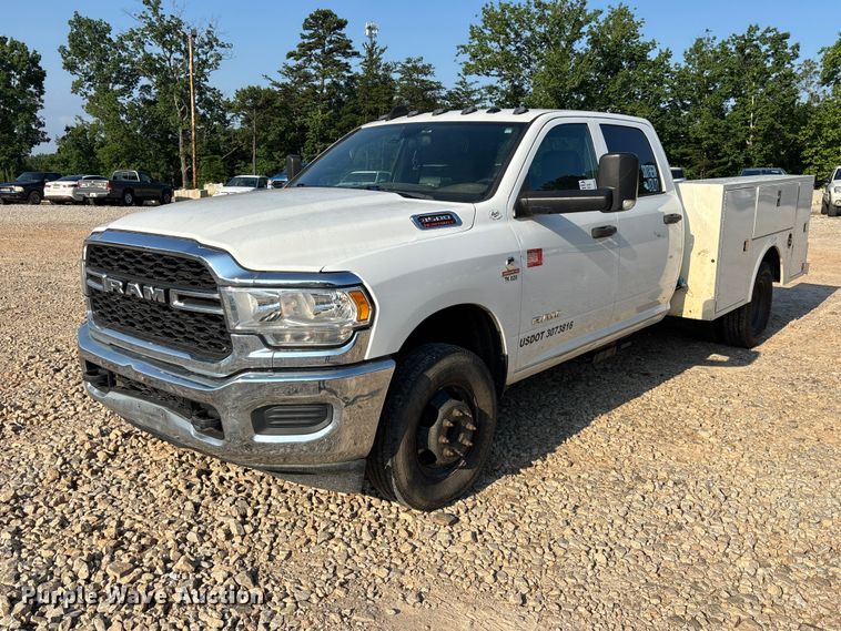 image for item DU6320 2021 RAM 3500 Crew Cab utility bed pickup truck