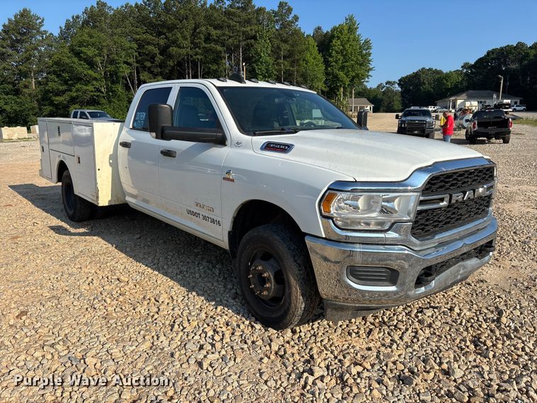 image for item DU6320 2021 RAM 3500 Crew Cab utility bed pickup truck