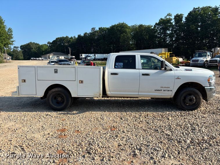 image for item DU6320 2021 RAM 3500 Crew Cab utility bed pickup truck