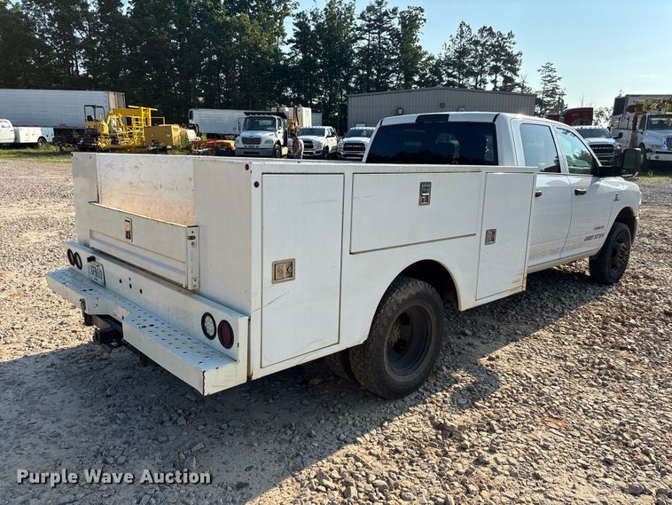 image for item DU6320 2021 RAM 3500 Crew Cab utility bed pickup truck